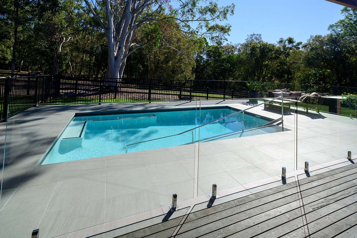 Jupiter Porcelain pool coping and surrounds with Urban Black Waterline tiles