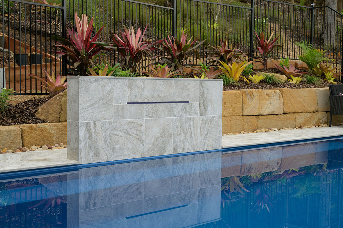 Platinum Travertino pool surrounds and feature wall
